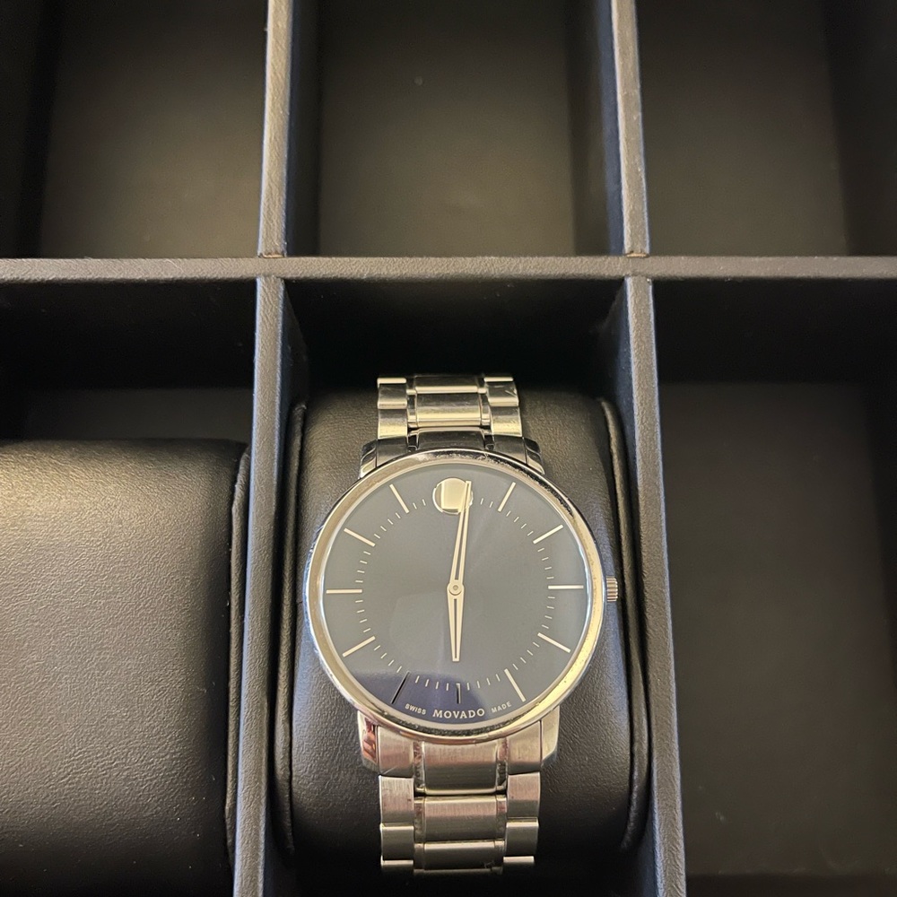 Movado thin classic blue dial stainless steel men’s watch
